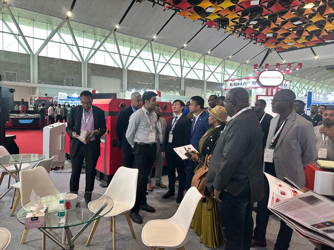 MonoTech Engineers Pvt Ltd team engaging with international delegates and clients at an industrial machinery expo. 